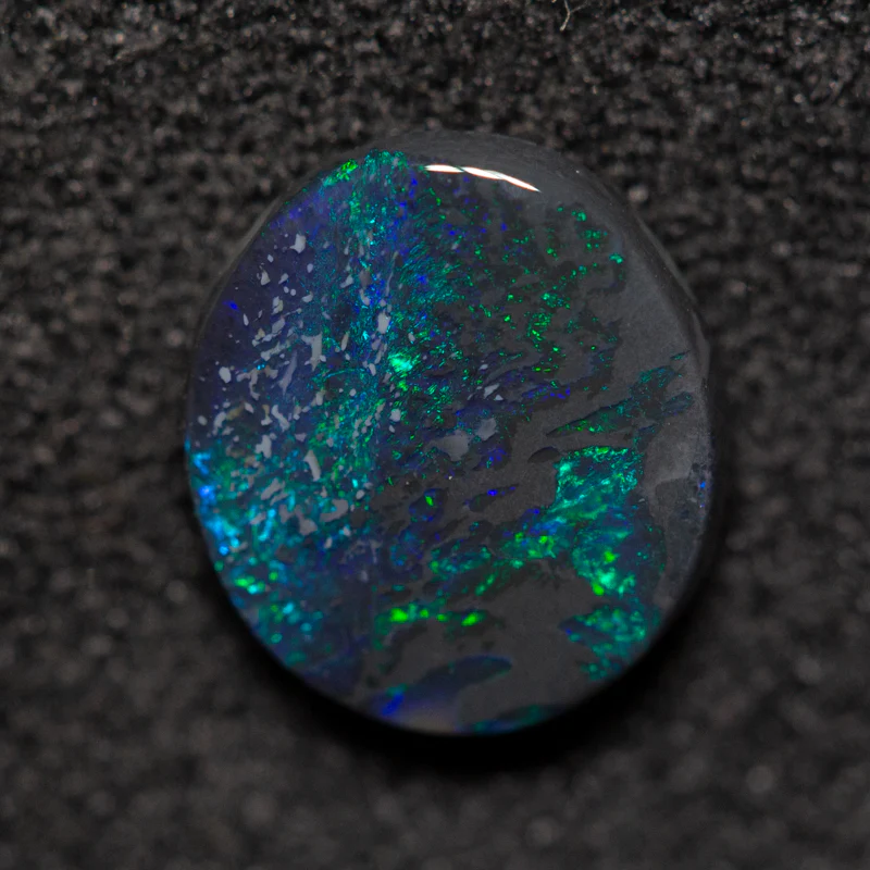 0.91 ct black opal 8x7.1x2.6mm - Image 2