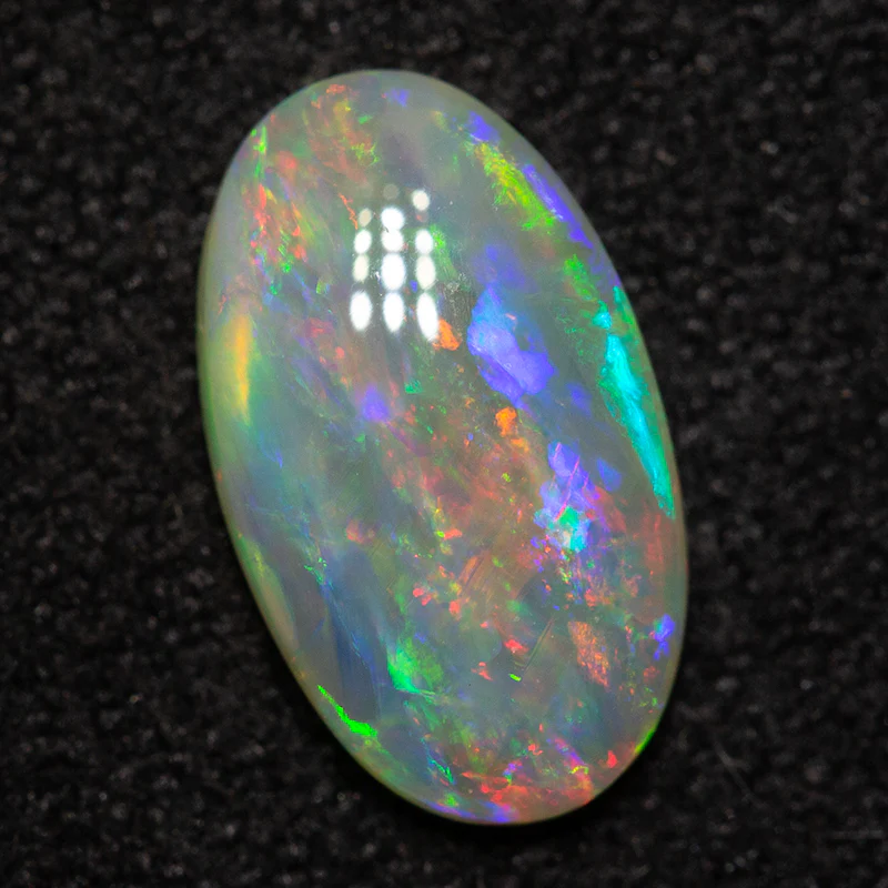 0.91 ct crystal opal 9.9x5.8x2.4mm - Image 4