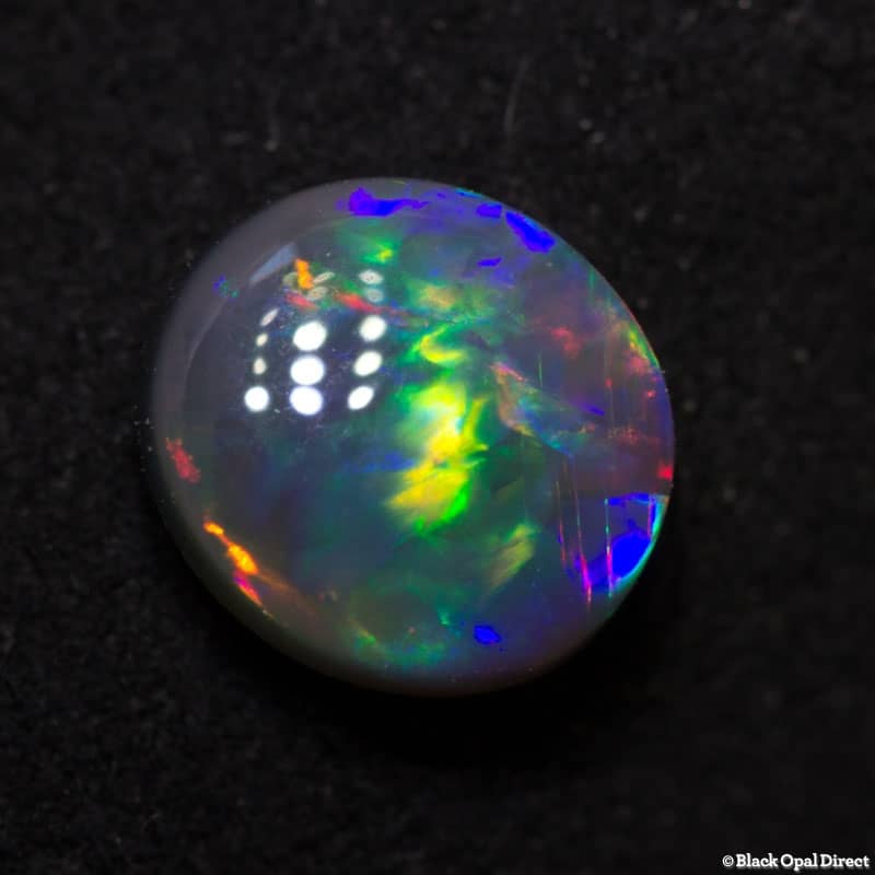 0.91 ct dark crystal opal 7x6.1x3mm - Image 3