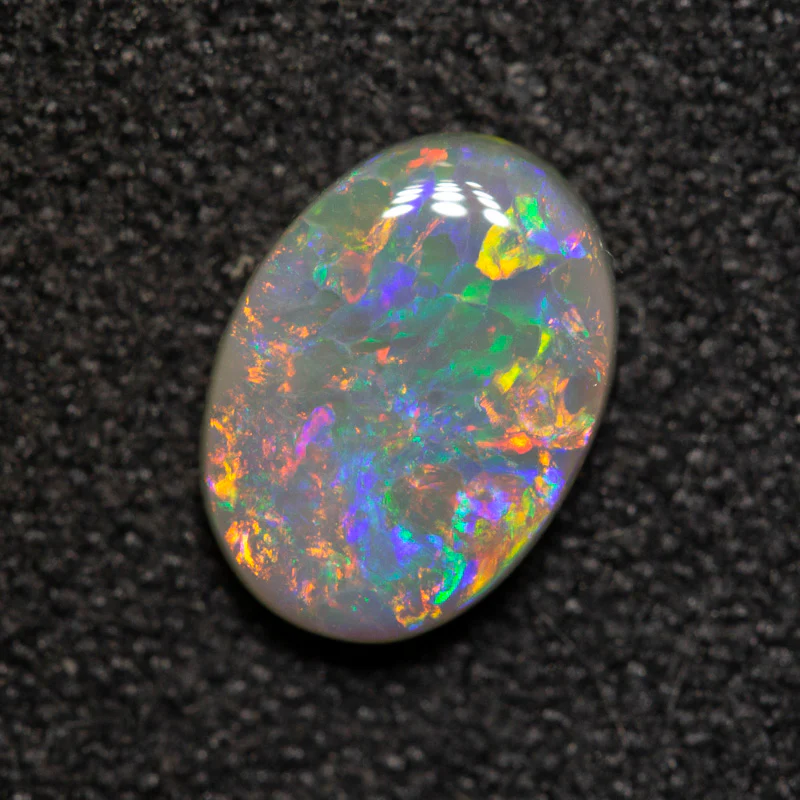 0.91 ct dark opal 8.1x5.9x2.6mm - Image 2