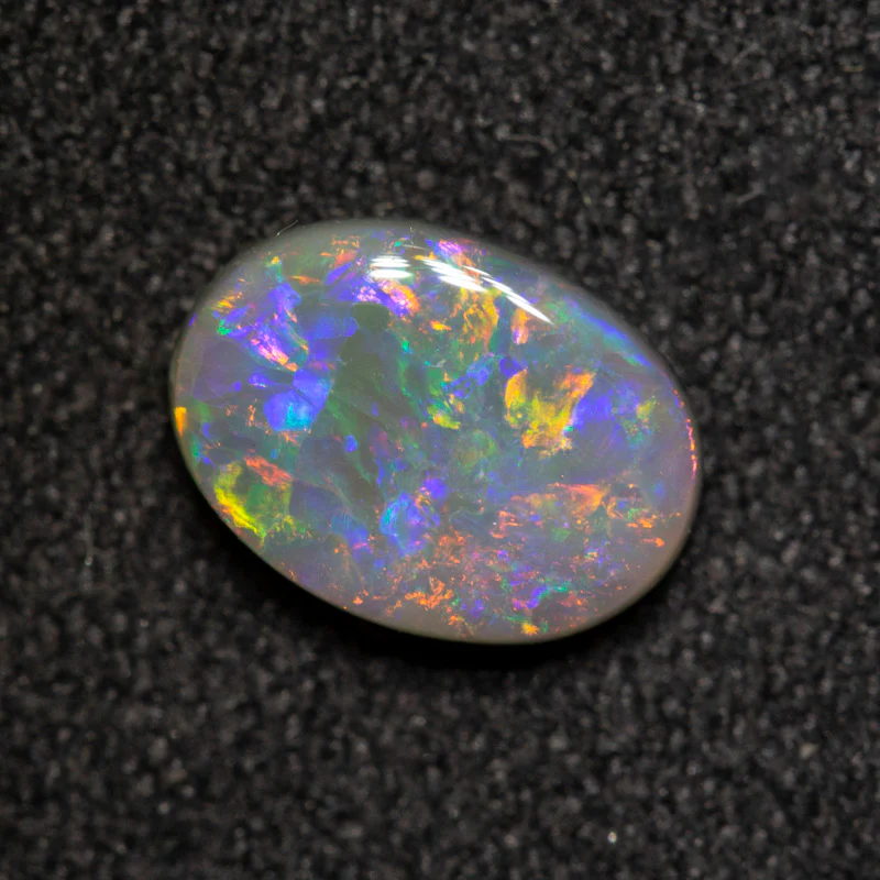 0.91 ct dark opal 8.1x5.9x2.6mm - Image 3