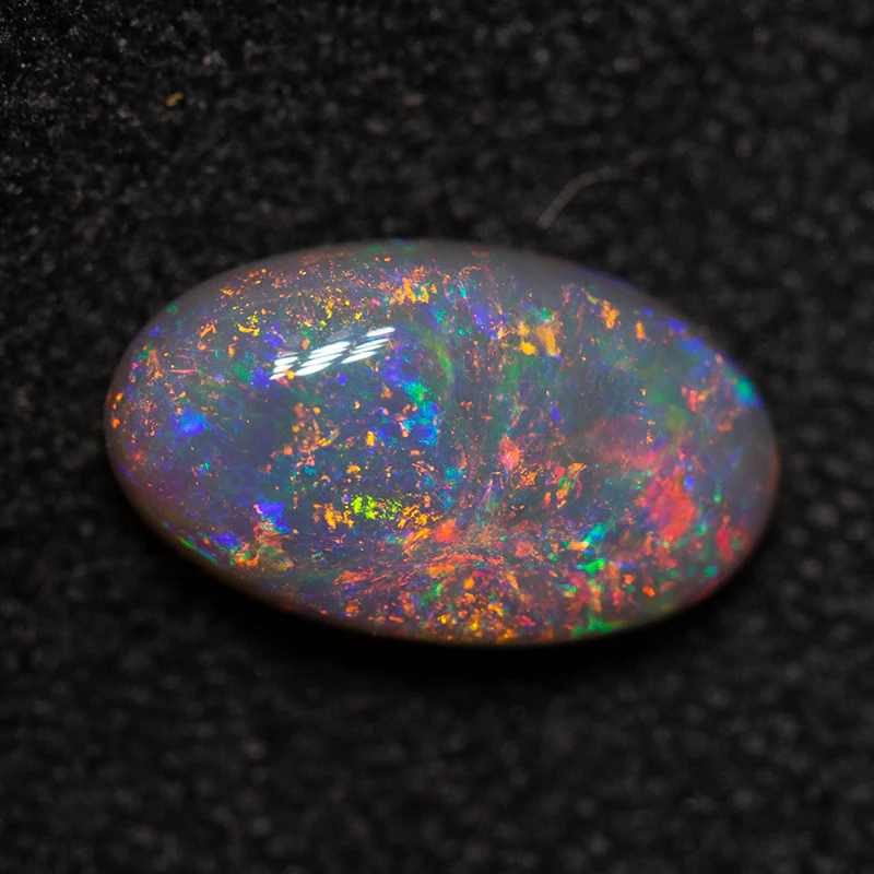 0.91 ct dark opal 8.9x5.2x3mm - Image 2