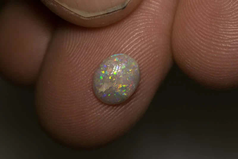 0.91 ct dark opal 8x6.5x2mm - Image 3
