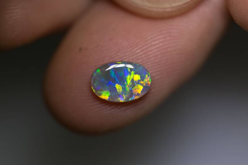 0.91 ct dark opal gem 9x6x2mm - Image 2