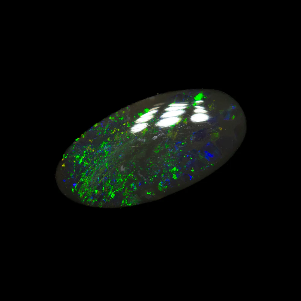 0.92 ct black opal 11.1x5.6x2.1mm - Image 2