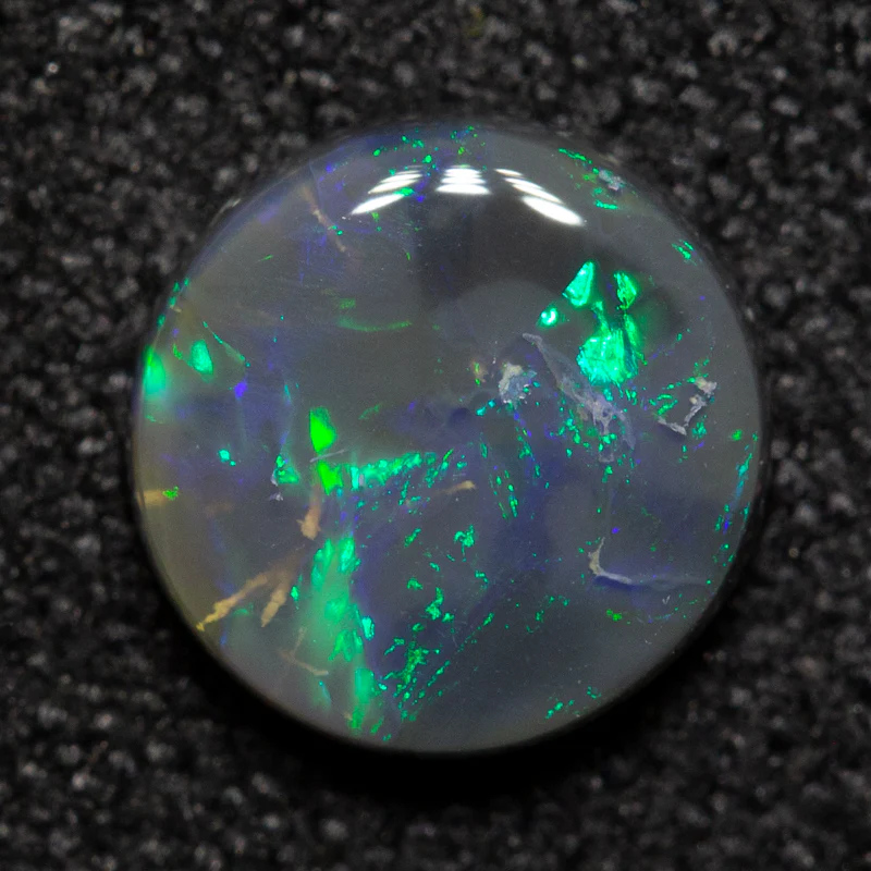 0.92 ct black opal 6.9x6.8x2.6mm - Image 2