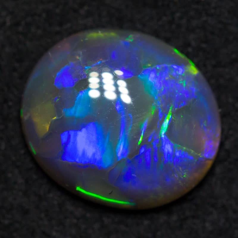 0.92 ct black opal 8.3x7x2.5mm - Image 2