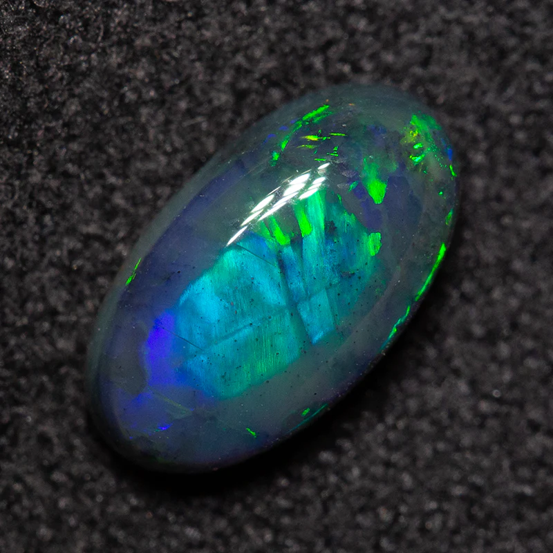 0.92 ct black opal 8.6x4.9x3.2mm - Image 4