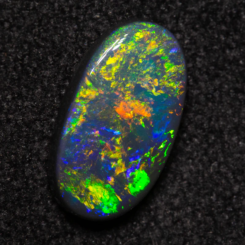 0.92 ct black opal 9.4x5.3x2.3mm - Image 2