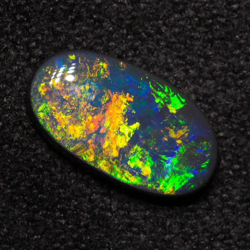 0.92 ct black opal 9.4x5.3x2.3mm - Image 3