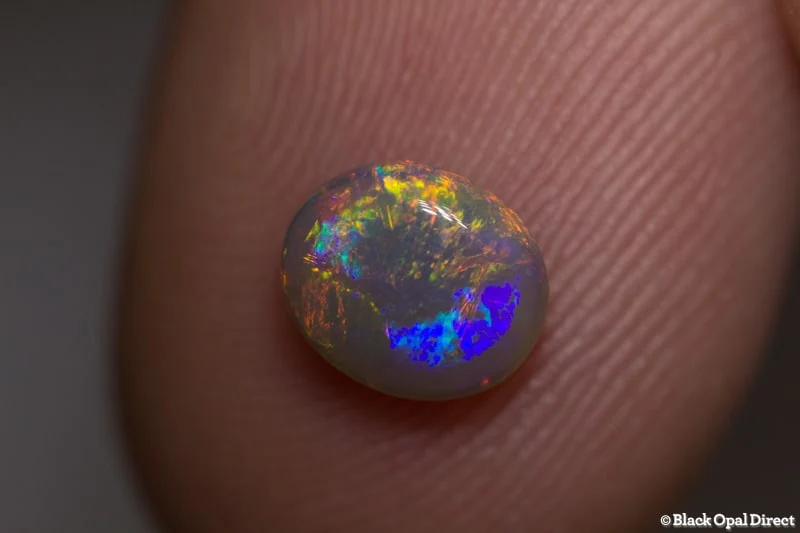0.92 ct semi black opal 7x6x3mm - Image 2