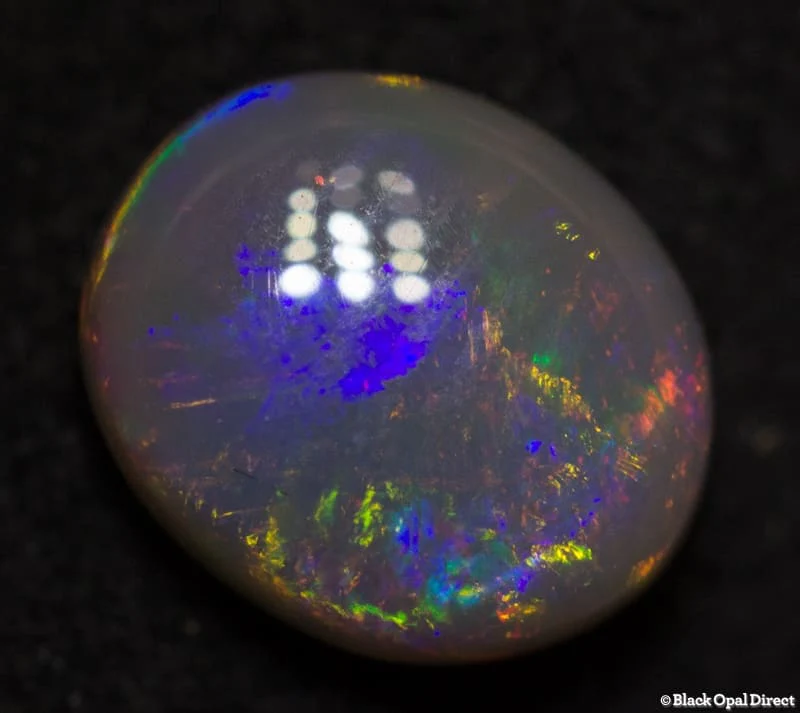 0.92 ct semi black opal 7x6x3mm - Image 3