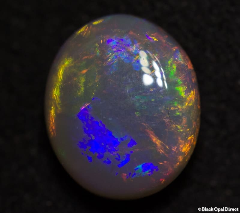 0.92 ct semi black opal 7x6x3mm - Image 4