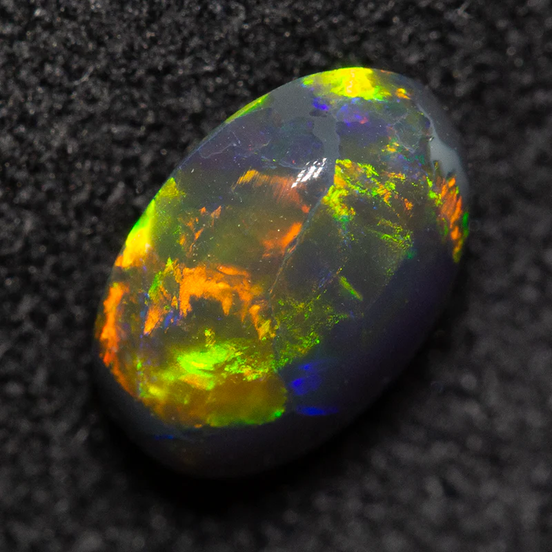 0.93 ct black opal 7.6x5.6x3.5mm - Image 3