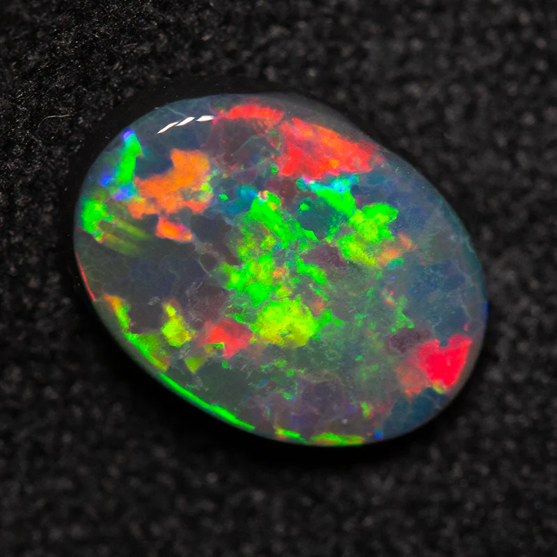 0.93 ct black opal 8.4x6.2x2.6mm - Image 2