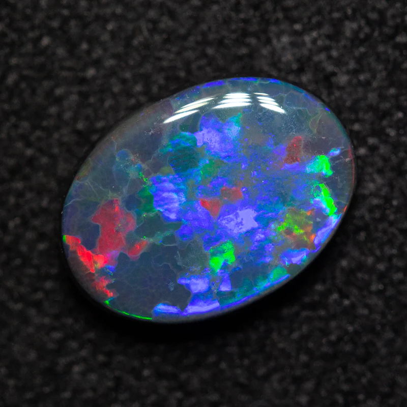 0.93 ct black opal 8.4x6.2x2.6mm - Image 3