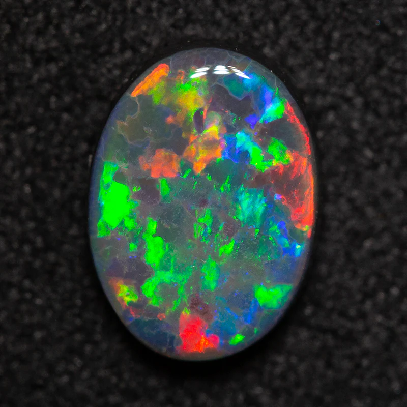 0.93 ct black opal 8.4x6.2x2.6mm - Image 4