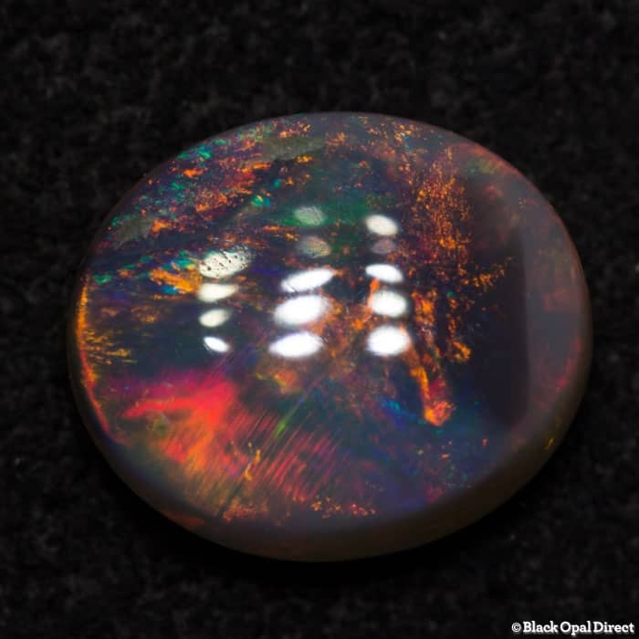 0.93 ct double sided semi black opal 7.5x6x3mm - Image 2