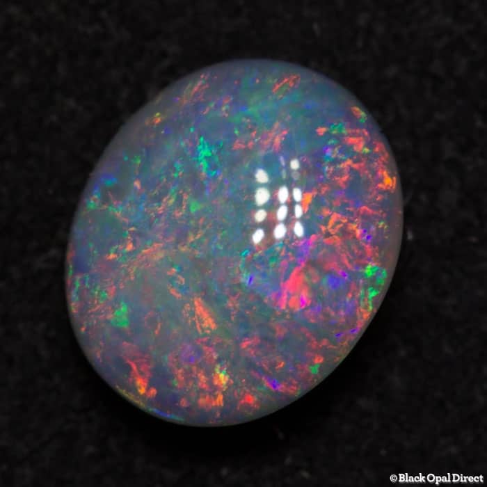 0.93 ct double sided semi black opal 7.5x6x3mm - Image 3