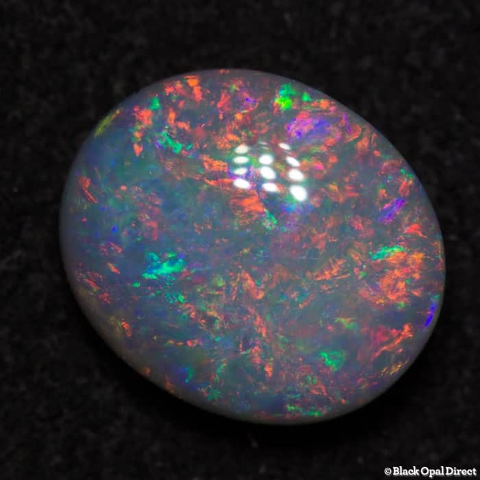 0.93 ct double sided semi black opal 7.5x6x3mm - Image 4