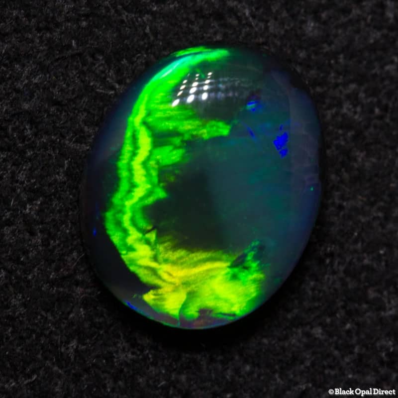 0.93 ct gem black opal with rolling flash pattern 7.9x6x3mm - Image 3