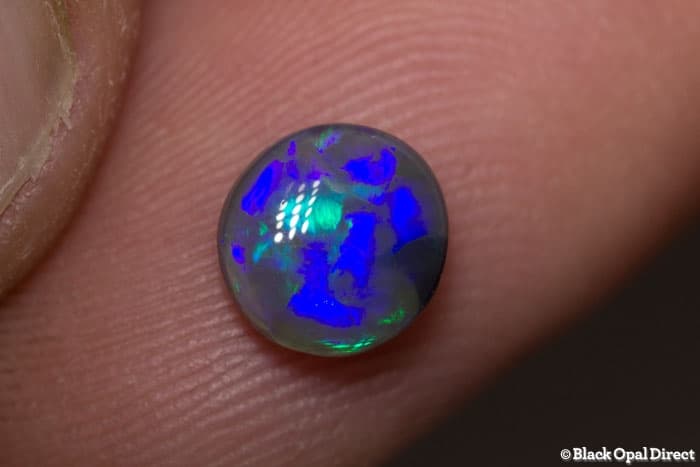 0.93 ct semi black opal 7x7x3mm - Image 3