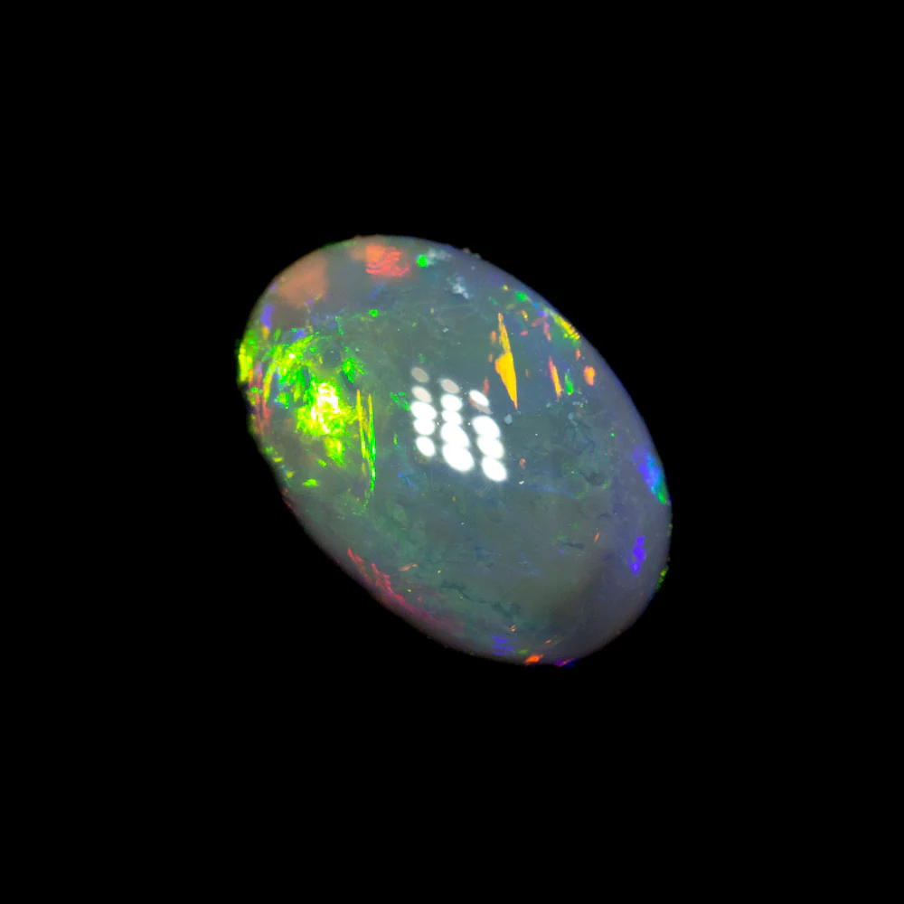 0.94 ct black opal 7.4x5.2x4mm - Image 2