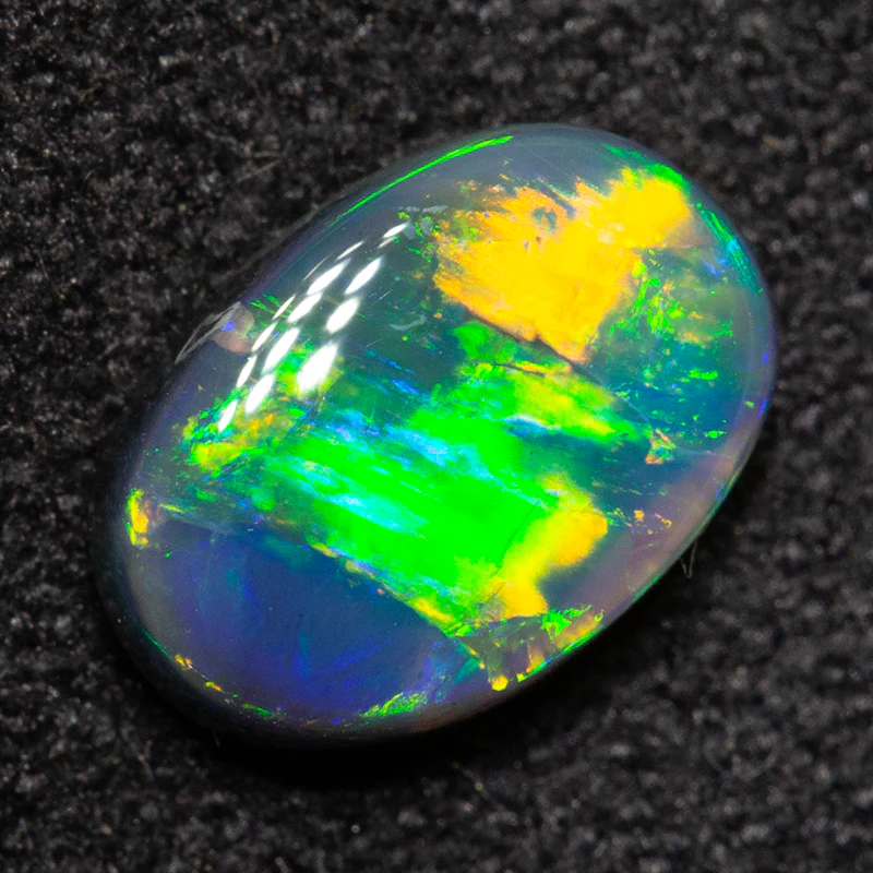 0.94 ct black opal 8x5.6x2.9mm - Image 3