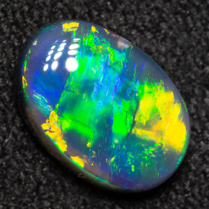 0.94 ct black opal 8x5.6x2.9mm - Image 4