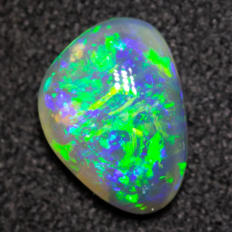 0.94 ct black opal 8x6x3mm - Image 2