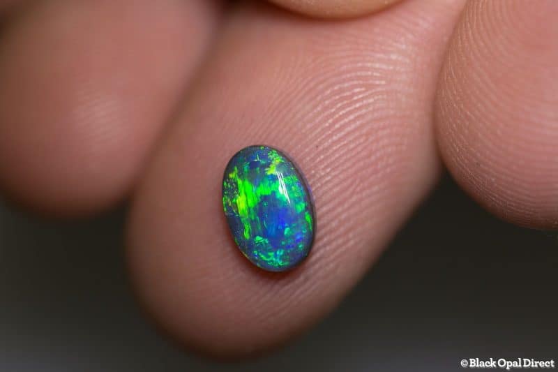 0.94 ct black opal 9x6x3mm - Image 2