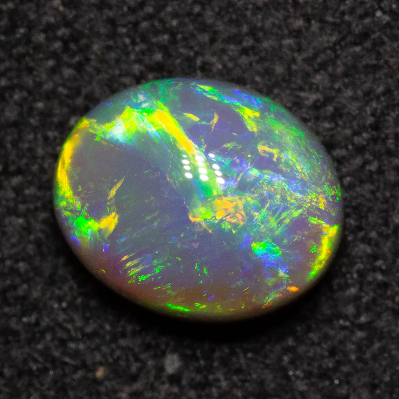 0.94 ct crystal opal 6.8x5.6x3.8mm - Image 2