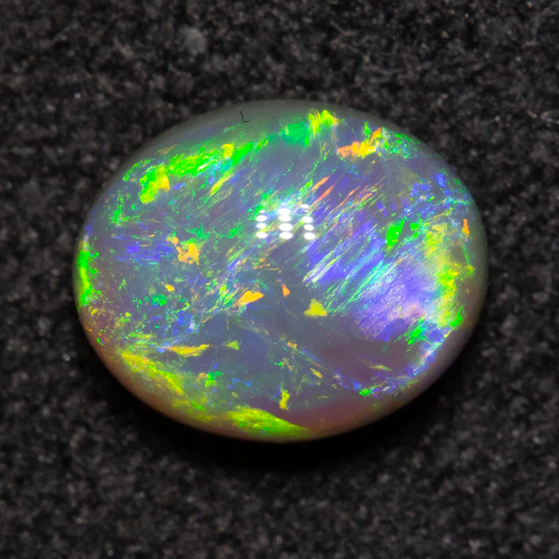 0.94 ct crystal opal 6.8x5.6x3.8mm - Image 3
