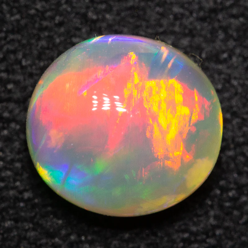 0.94 ct crystal opal 6.9x6.5x3.7mm - Image 2