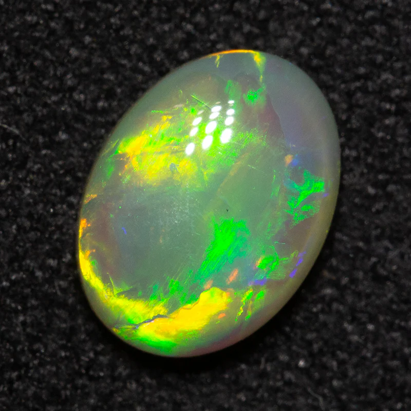 0.94 ct crystal opal 8.1x6x2.9mm - Image 3