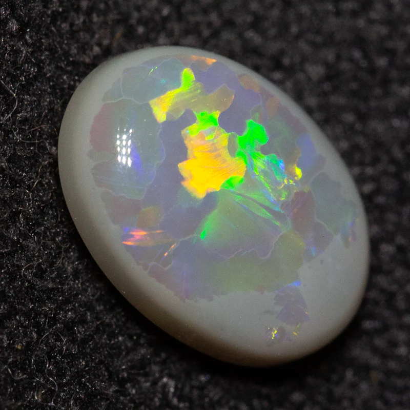 0.94 ct dark opal 8x5.9x3mm - Image 2
