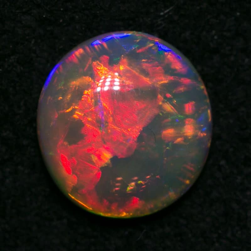 0.94 ct gem double sided crystal opal 7mm round x 3mm - Image 5