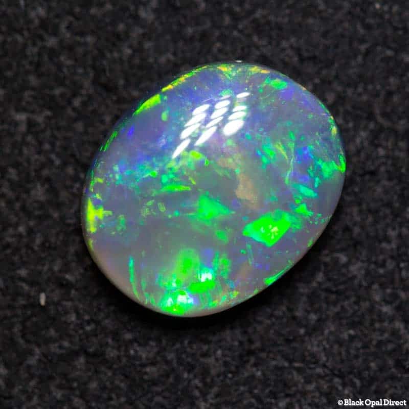 0.94 ct semi black opal 7x6x3mm - Image 3