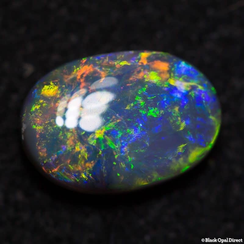 0.94 ct semi black opal 8x5.5x3mm - Image 2