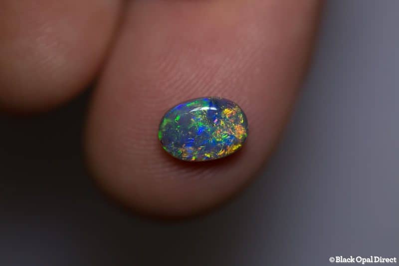 0.94 ct semi black opal 8x5.5x3mm - Image 4
