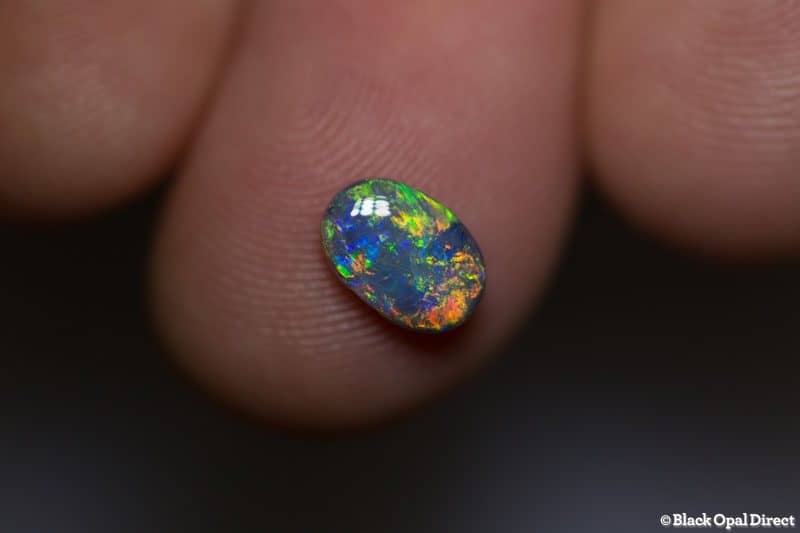 0.94 ct semi black opal 8x5.5x3mm - Image 5