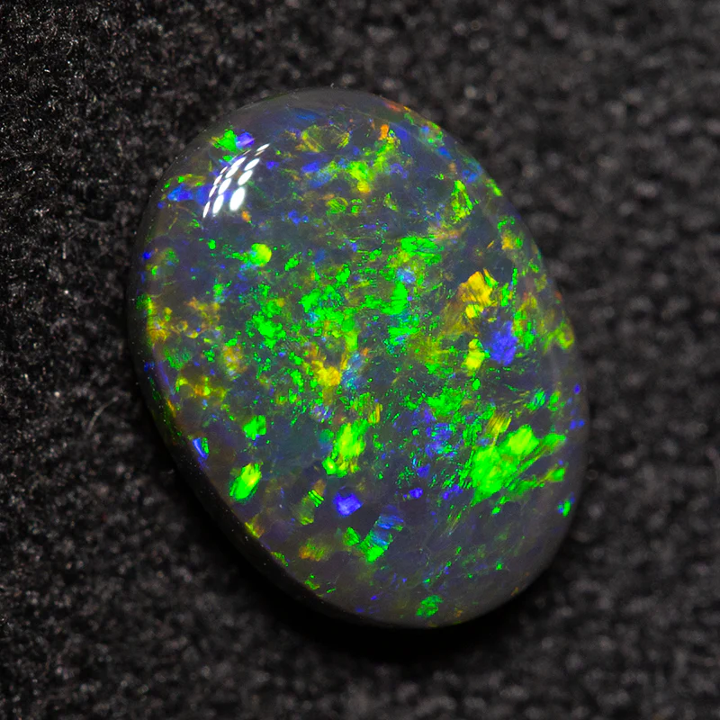 0.95 ct black opal 8x6x2.8mm - Image 2