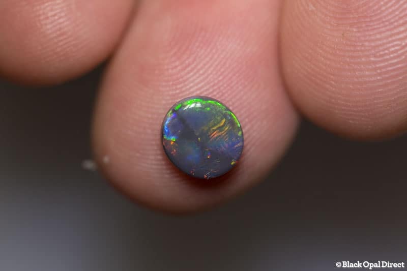 0.95 ct black opal 8x7x2mm - Image 2