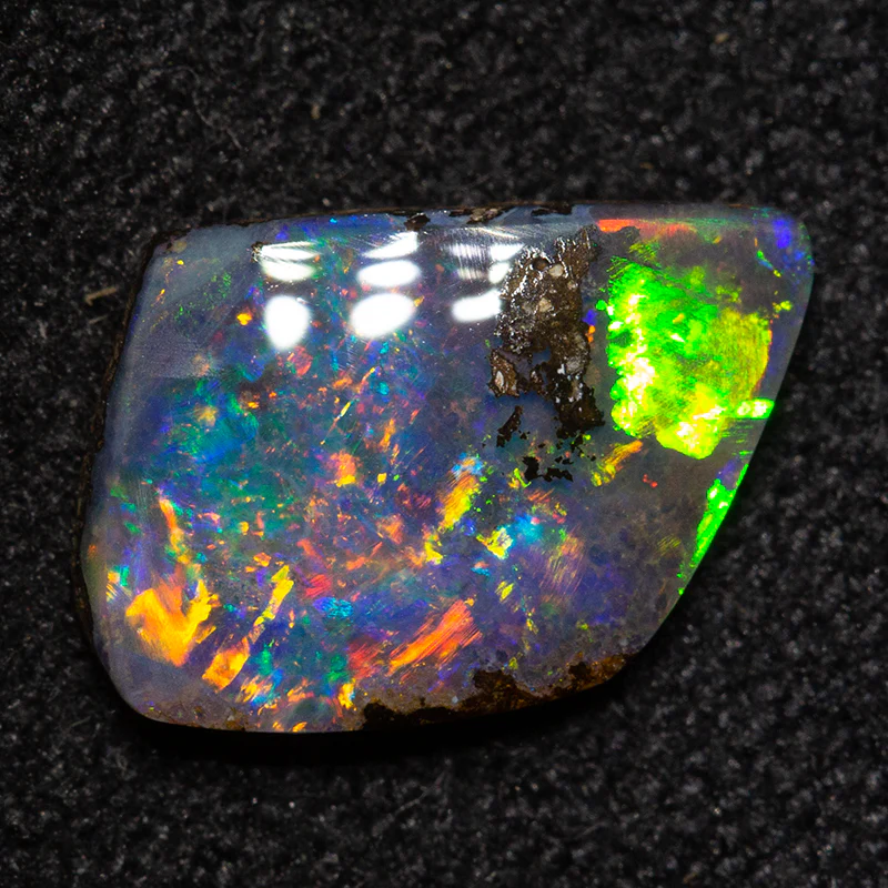 0.95 ct boulder opal 8.6x6.6x1.9mm - Image 3