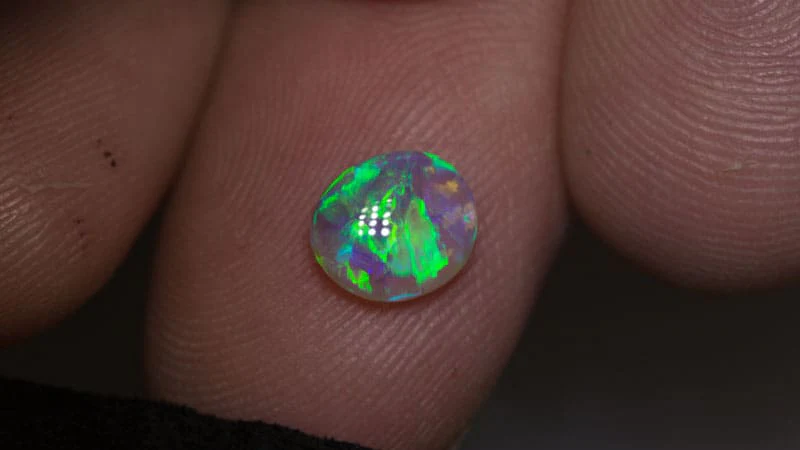 0.95 ct crystal opal 7.5x6.5x3mm - Image 2