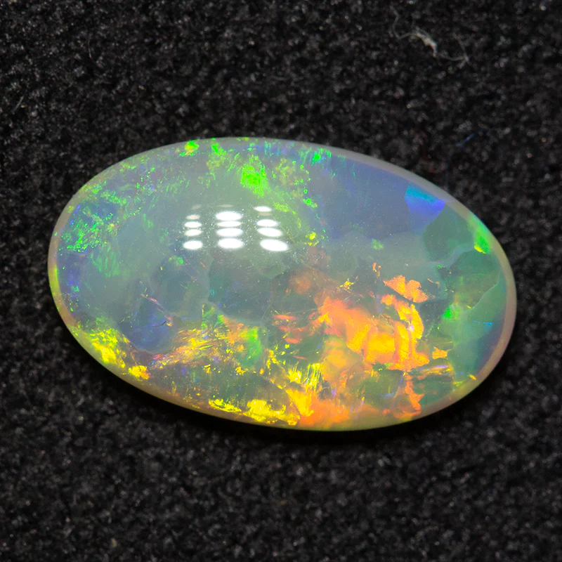 0.95 ct dark crystal opal 9.9x6x2.6mm - Image 2