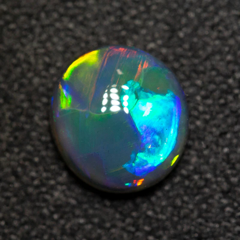 0.95 ct gem black opal 6.9x6.3x3.5mm - Image 2