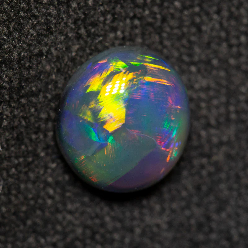 0.95 ct gem black opal 6.9x6.3x3.5mm - Image 4