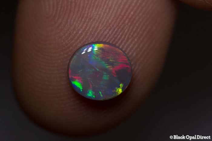 0.95 ct semi black opal 7.5x7x3mm - Image 2