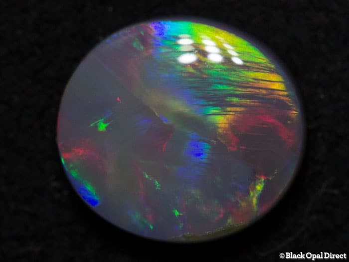 0.95 ct semi black opal 7.5x7x3mm - Image 3
